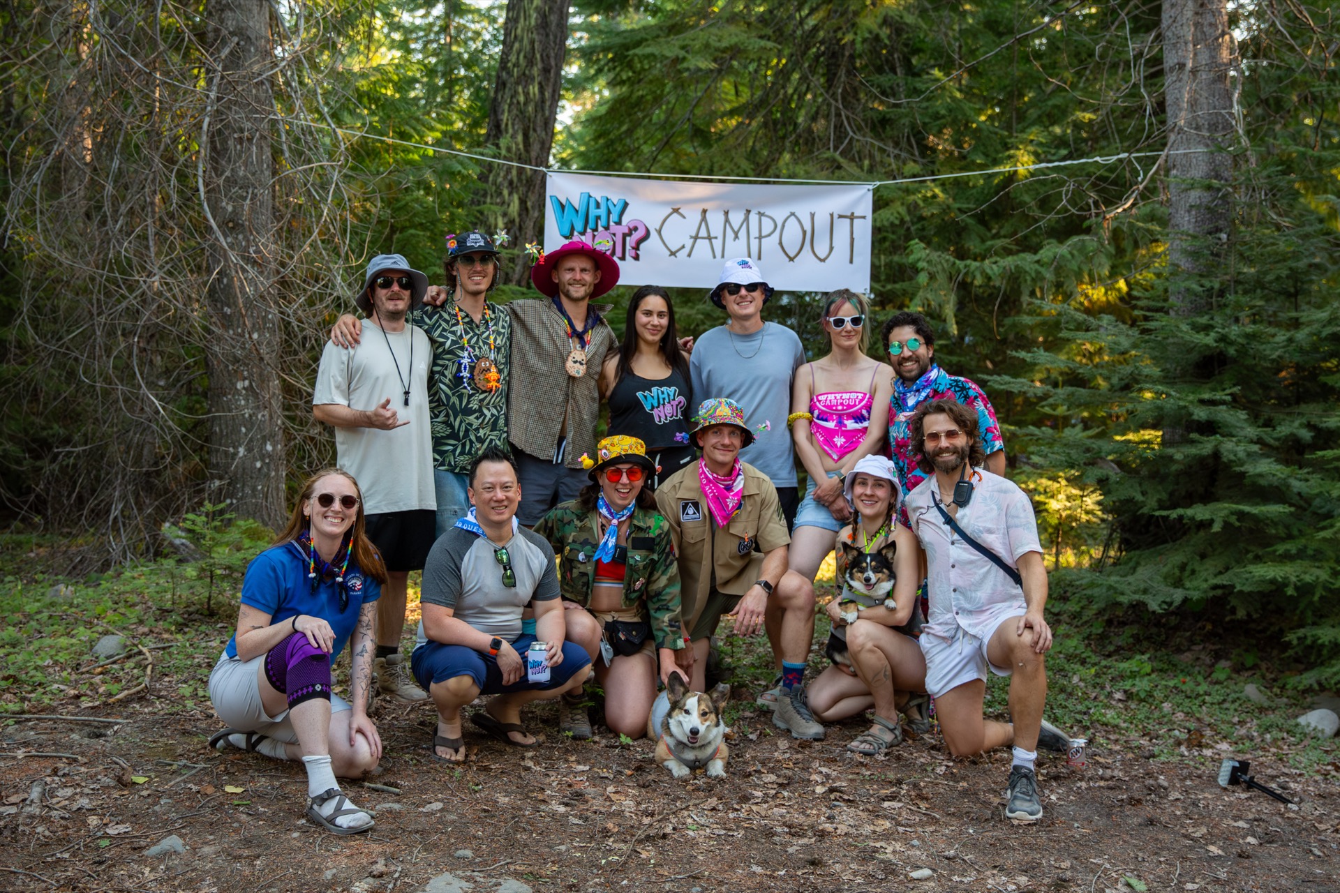 Campout 2025 group photo by the camp banner